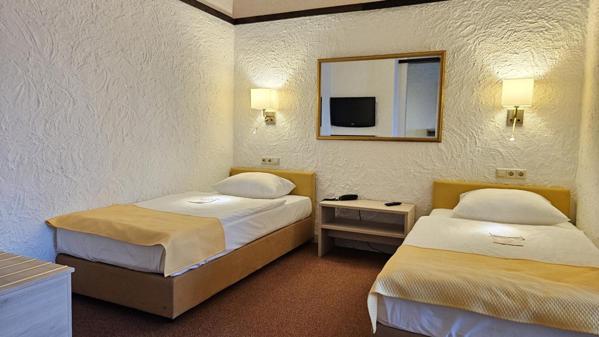 Premium Doppel- oder Zweibettzimmer